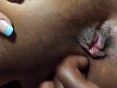Nutz fists black whore's gaping big pussy till she squirts hard