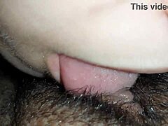 wet brunette lesbians dive into hairy pussy licking and clit sucking up close!