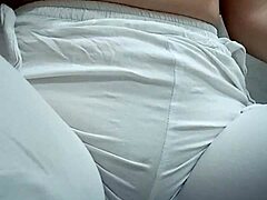 Close-Up View of Woman Urinating from Spread Pussy Lips in Detail