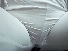 Close-Up View of Woman Urinating from Spread Pussy Lips in Detail