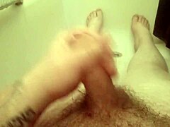 Guy wanks penis in shower solo amateur masturbation bath