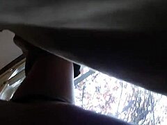 exhibitionist babe fingers wet pussy in public restroom