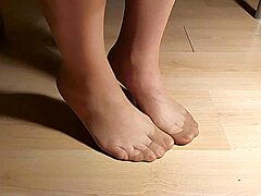 You seeing these outstanding feet in suntanned pantyhose from the compilation?