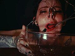 emo goth whore tied up bound punished rough with piss in garage cries