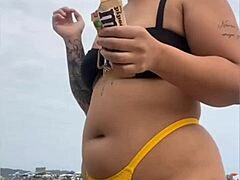 wanna see this yellow bikini splitting my swollen black pussy on the beach?