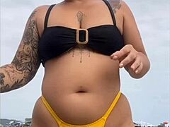 wanna see this yellow bikini splitting my swollen black pussy on the beach?