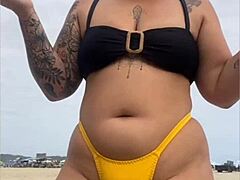 wanna see this yellow bikini splitting my swollen black pussy on the beach?