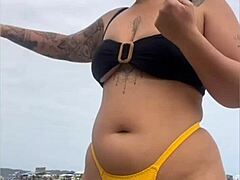 wanna see this yellow bikini splitting my swollen black pussy on the beach?