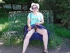 Does this hairy mature's see-through dress reveal her chubby beaver for outdoor flashing thrills?