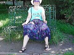 Does this hairy mature's see-through dress reveal her chubby beaver for outdoor flashing thrills?