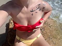 hot tattooed blonde teen fingers pussy hard on crowded public beach