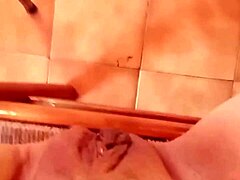 brunette relaxes slow teasing her pregnant pussy closeup