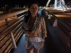 luscious curvy milf struts braless pantyless on bridge flashing huge tits