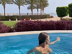 Monika Fox skinny dips naked pool sea hot country pierced nipples long hair tattoo softcore