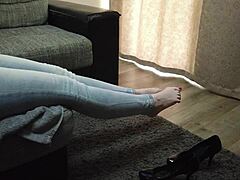Jeans-clad milf tempts foot worship with sexy legs and toes
