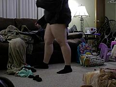 Chubby mom's shorts hug her sexy ass while cleaning