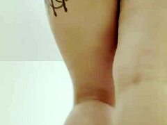 Blonde with big natural tits and huge ass shakes boobs in tight miniskirt