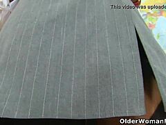 Hey British granny Georgie stuffs dildos in her nylon arse and pussy