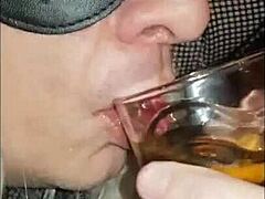 Blindfolded Crossdresser Swallows Girlfriend's Pee Load