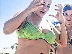 two latina sluts flash sensual beach exhibition for public eyes