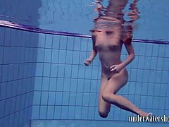 Lucy Boldly Strips Bikini in Teasing Pool Splash