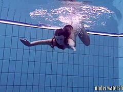 Lucy Boldly Strips Bikini in Teasing Pool Splash