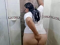 Colombian cutie fingers wet huge tits and juicy ass in bathroom with stepbro's shirt tease