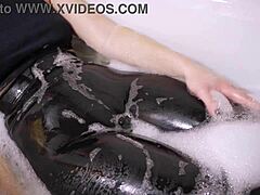 Stepsis shows off her snug outline in tight leather pants by the pool