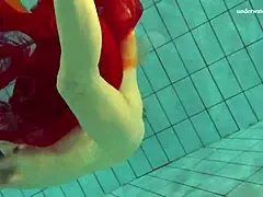 Nastya Strips Naked And Reveals Tight Pussy With Brunette Tits In Pool