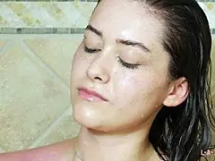 Sexy brunette model steams up during a provocative shower session