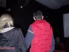Hey, wanna see my first gangbang at a porn cinema? Tons of guys unloading in my mouth!