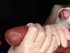 Close-up view of medical urethra exam extracting amateur sperm sample.