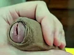 Cute young twink jerks big penis in Brazilian neighborhood.