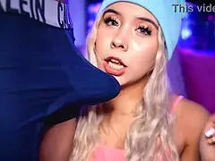 blonde college student with a cute face stimulates her boyfriends cock over his boxer shorts