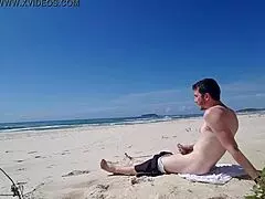 risky beach jerk off session in broad daylight