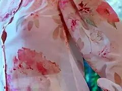 Blonde actress shows off dresses for a walk.