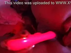 A mature African woman explores PUSSY FINGERING and ANAL PLAY with dildos.