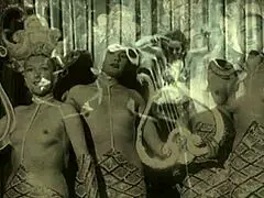 Vintage showgirls in retro performance.