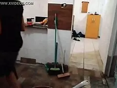 Blonde MILF shows off big tits while cooking in the kitchen