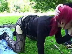 The horny redhead's pussy gets fucked hard next door outdoors