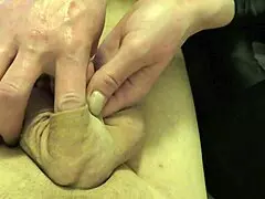 European milf plays with foreskin and uses latex gloves in homemade video