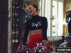 i’m so into teenfidelity’s cute cheerleader liza rowe shaking pom poms.