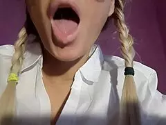 A mistress in nylon performs bdsm spitting in a foot fetish session