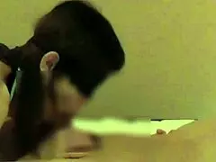 a stunning woman in chinese dress gives handjob and blowjob till ejaculation