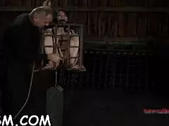 gagged and tied up serf is being pleasured with vibrator