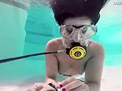 Brita Piskova fingers herself underwater in pool