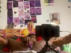 She masturbates pussy with dildo, fingering doggystyle in front of mirror