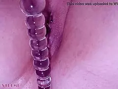 Step-sisters creamy pink pussy squirts orgasms with a glass dildo.