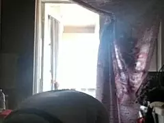 She applies lotion to her sexy skin