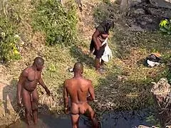 two strangers bang this teenage village girl by the river one after another